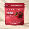 CHICOLATTE Bitter Çikolata Kaplı Cranberry 50 g, sıcak krem zeminde ambalaj fotoğrafı